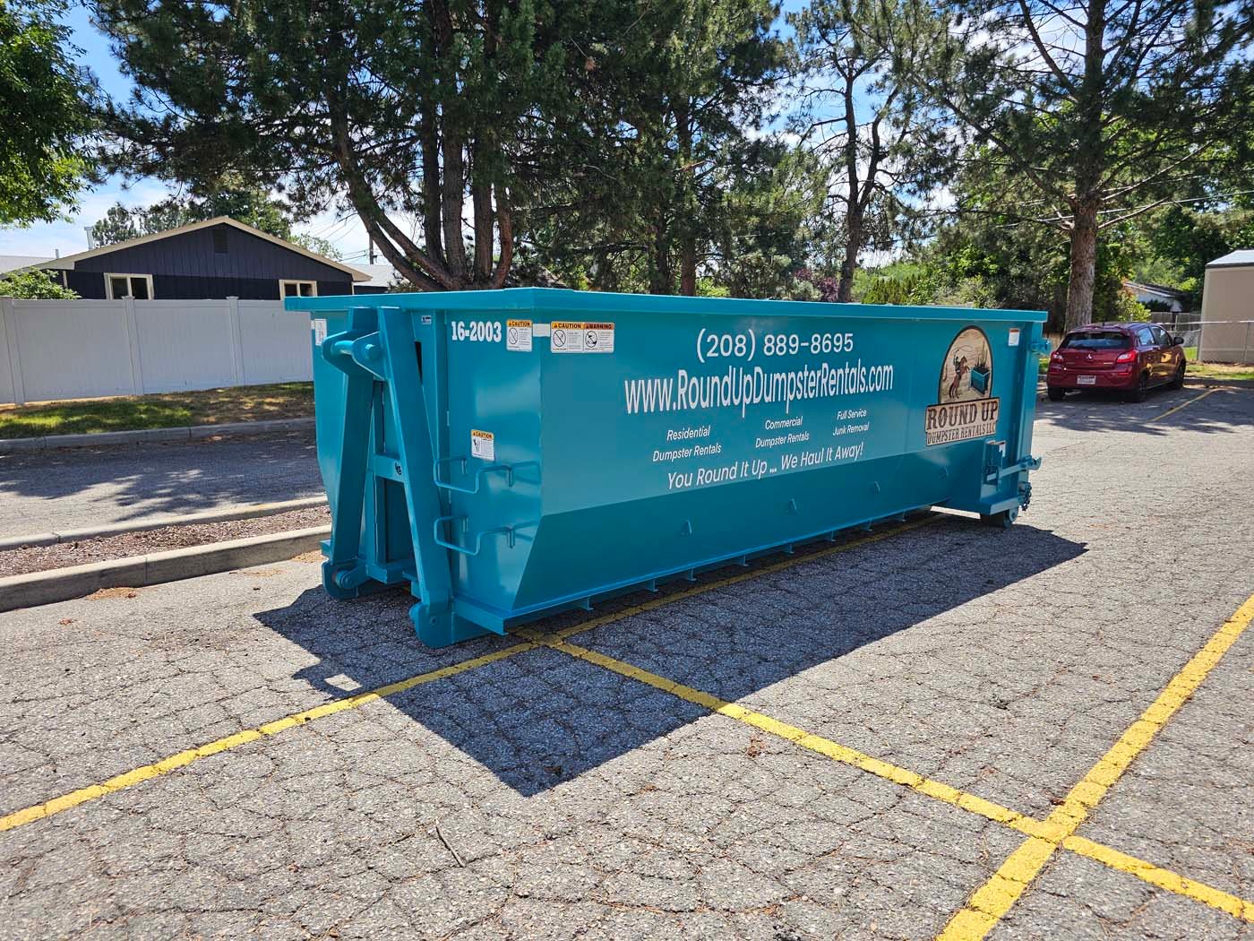 Clean 20-yard roll-off dumpster rental from Round Up Dumpster Rentals
