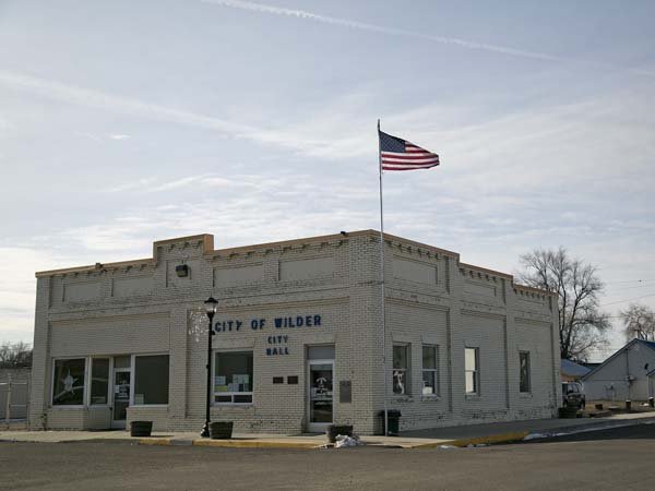 Wilder Idaho City Hall with the American Flag flying proudly above